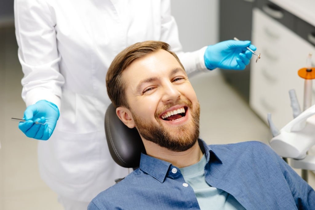Dentists with patient